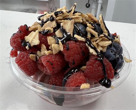 bowl'd - acai, fruits, and more reviews  I am genuinely confused by the thought process of whoever designed this bowl because they literally chose to put all the fruits that "bite you back" (kiwi, pineapple) together